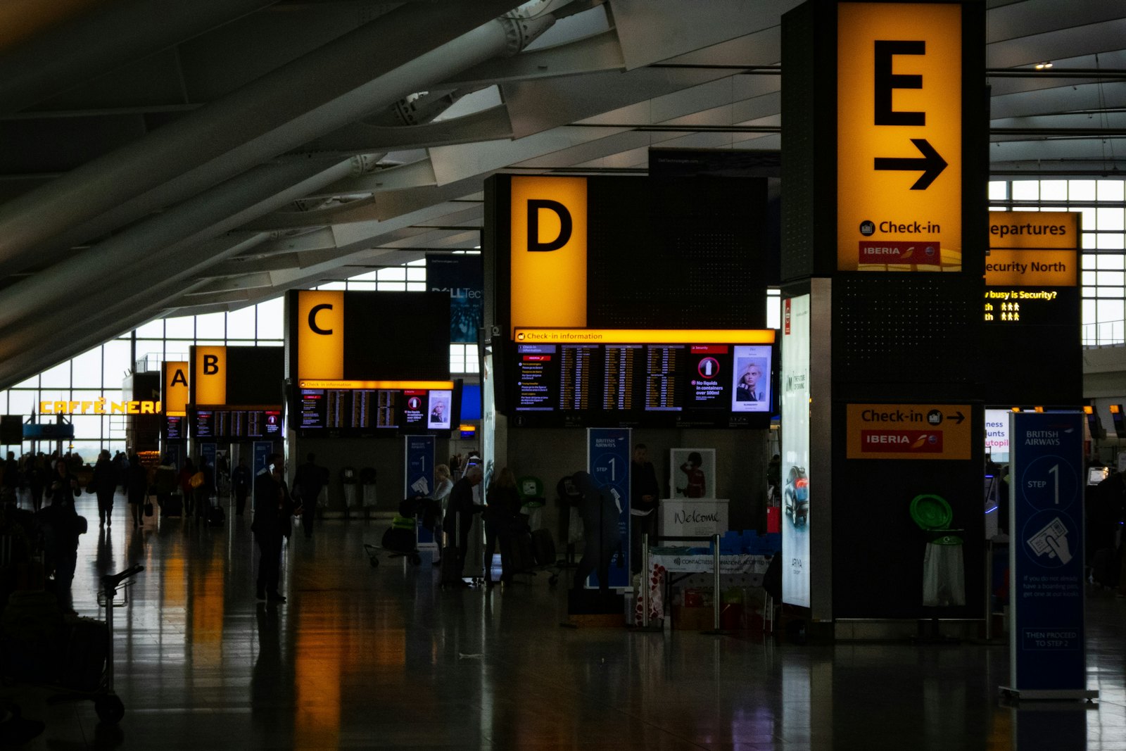 Departure gate signage in an airport terminal